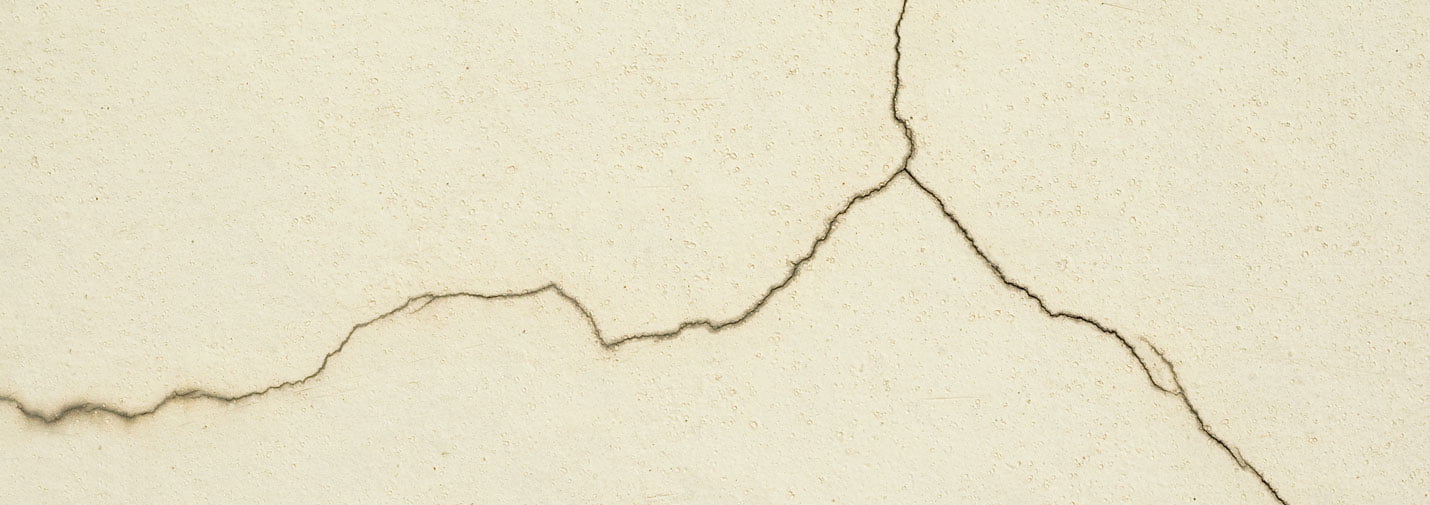 cracked stucco wall