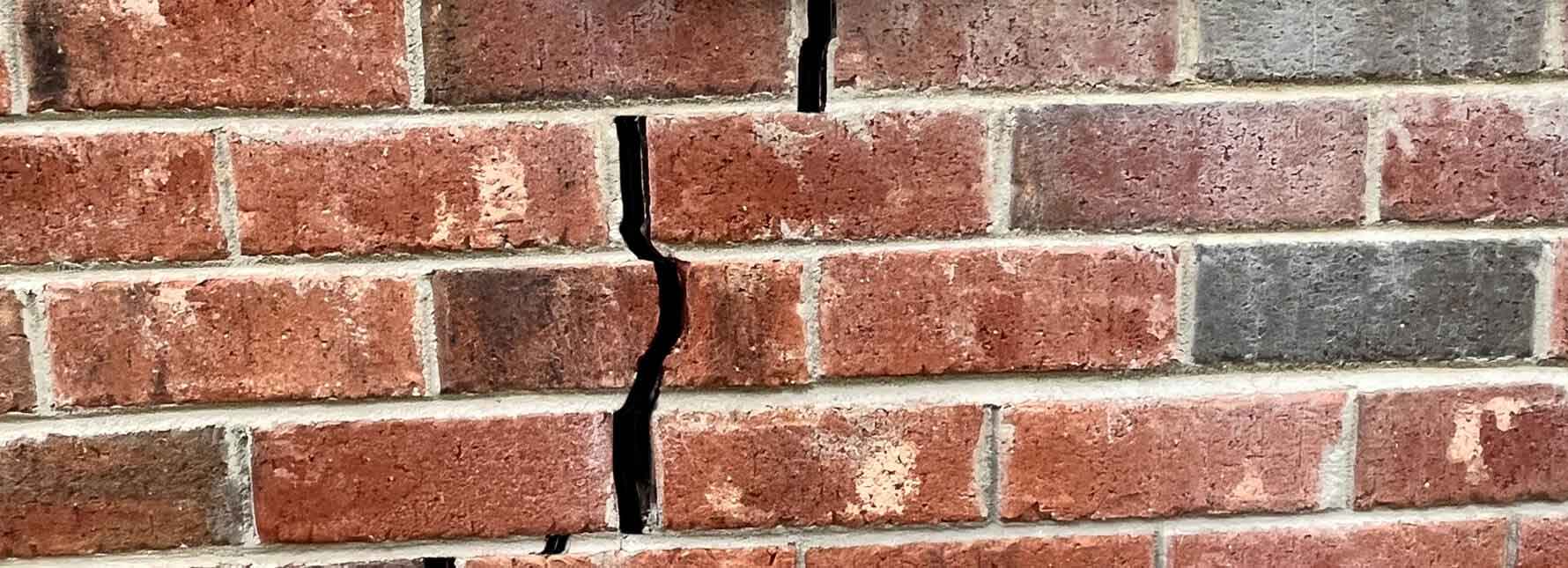 cracked brick- foundation damage