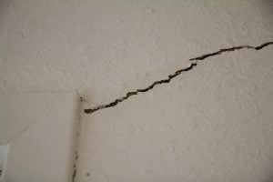 Crack in wall from foundation issue; interior wall